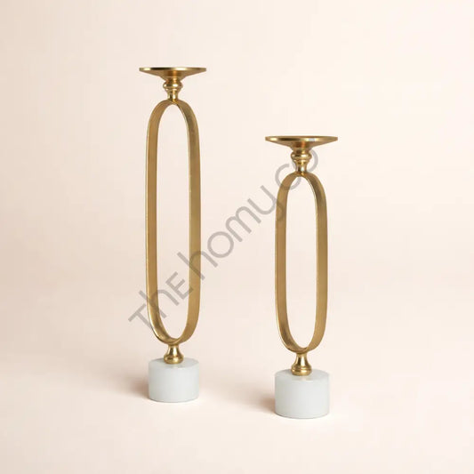 Gold metal pillar candle holder set with marble base for elegant table decor and home styling. - 2