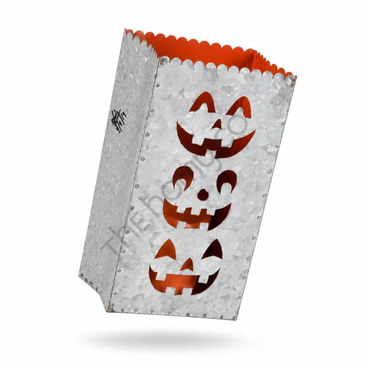 Galvanized metal Halloween jack-o-lantern treat bag lantern with stacked pumpkin cutouts and orange interior for festive home decor. - 2