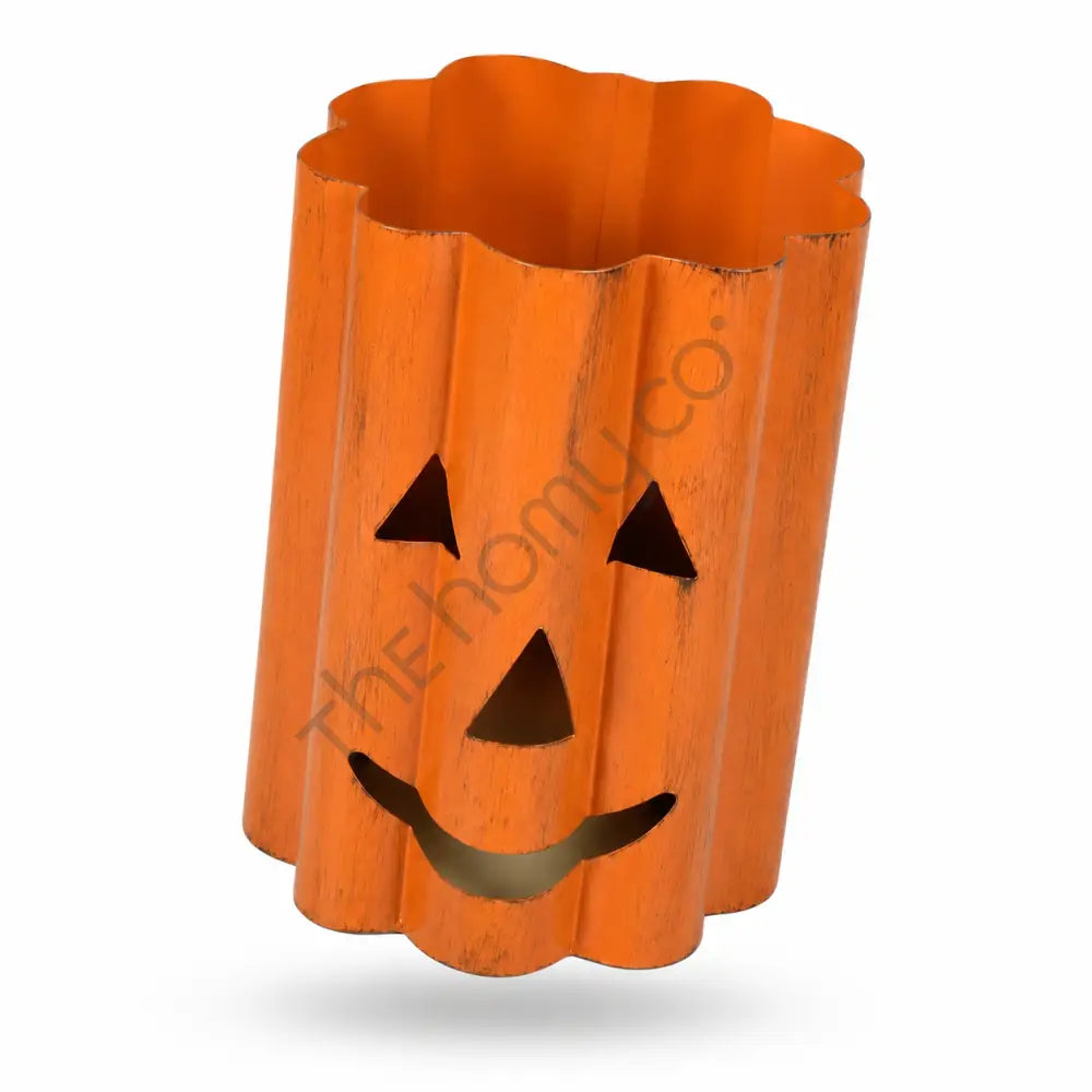 Rustic orange metal Halloween pumpkin lantern with a jack-o-lantern cutout face for spooky home decor. - 2