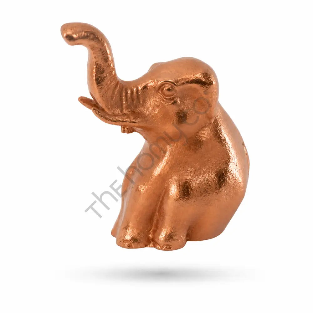 Elegant rose gold elephant figurine with raised trunk for luck and prosperity home decor. - 3
