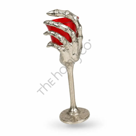Skeleton hand tealight candle holder with red glass cup for gothic Halloween decor. - 2