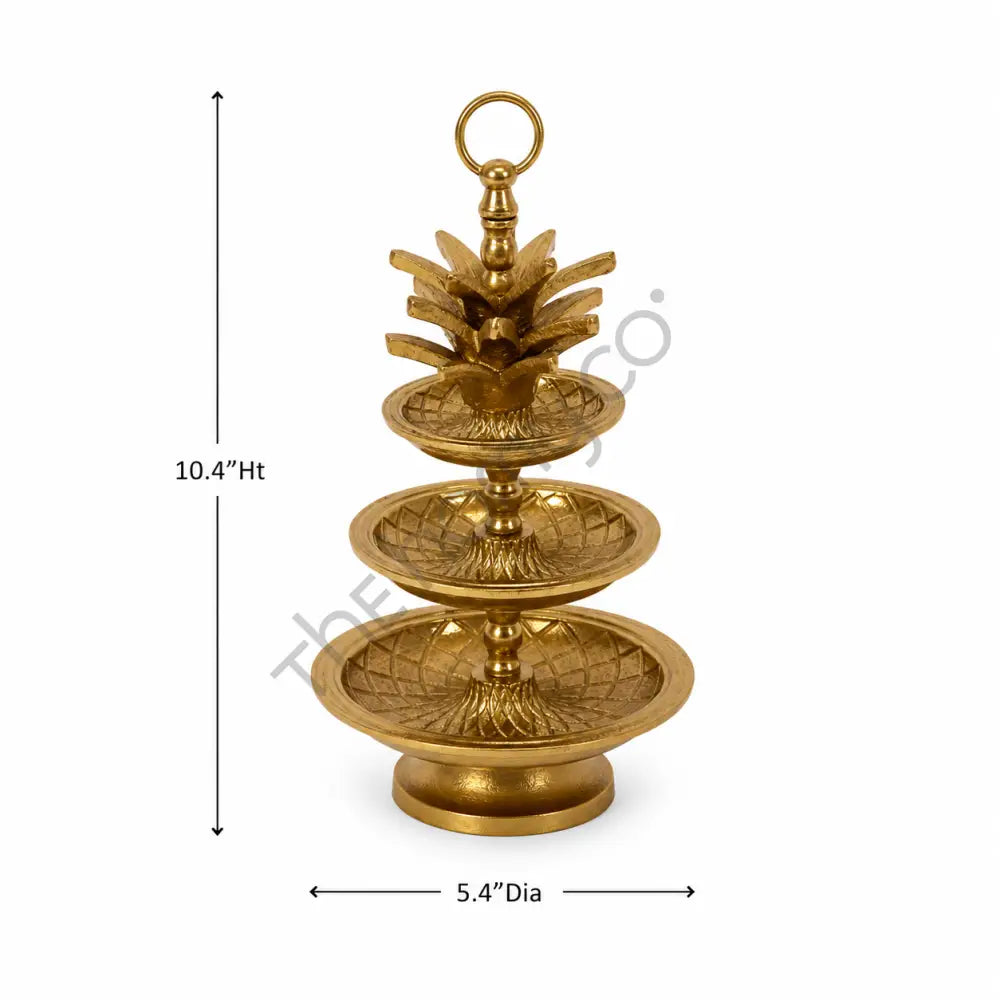 3-tier gold decorative fruit and dessert stand with intricate detailing for elegant tabletop serving. - 3