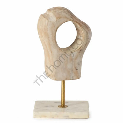 Abstract marble sculpture on a sleek metal stand for modern tabletop home and office decor.