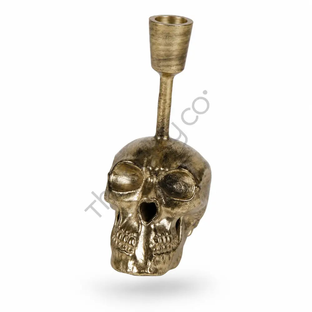 Antique gold skull taper candle holder with a detailed skull base for gothic home decor and Halloween styling. - 2