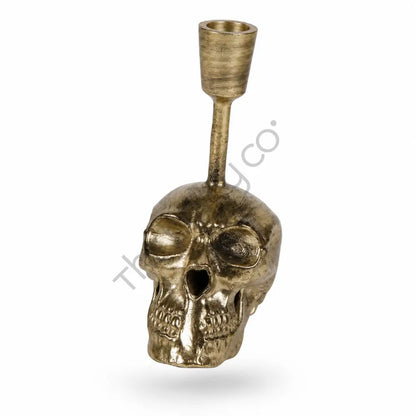 Antique gold skull taper candle holder with a detailed skull base for gothic home decor and Halloween styling. - 2