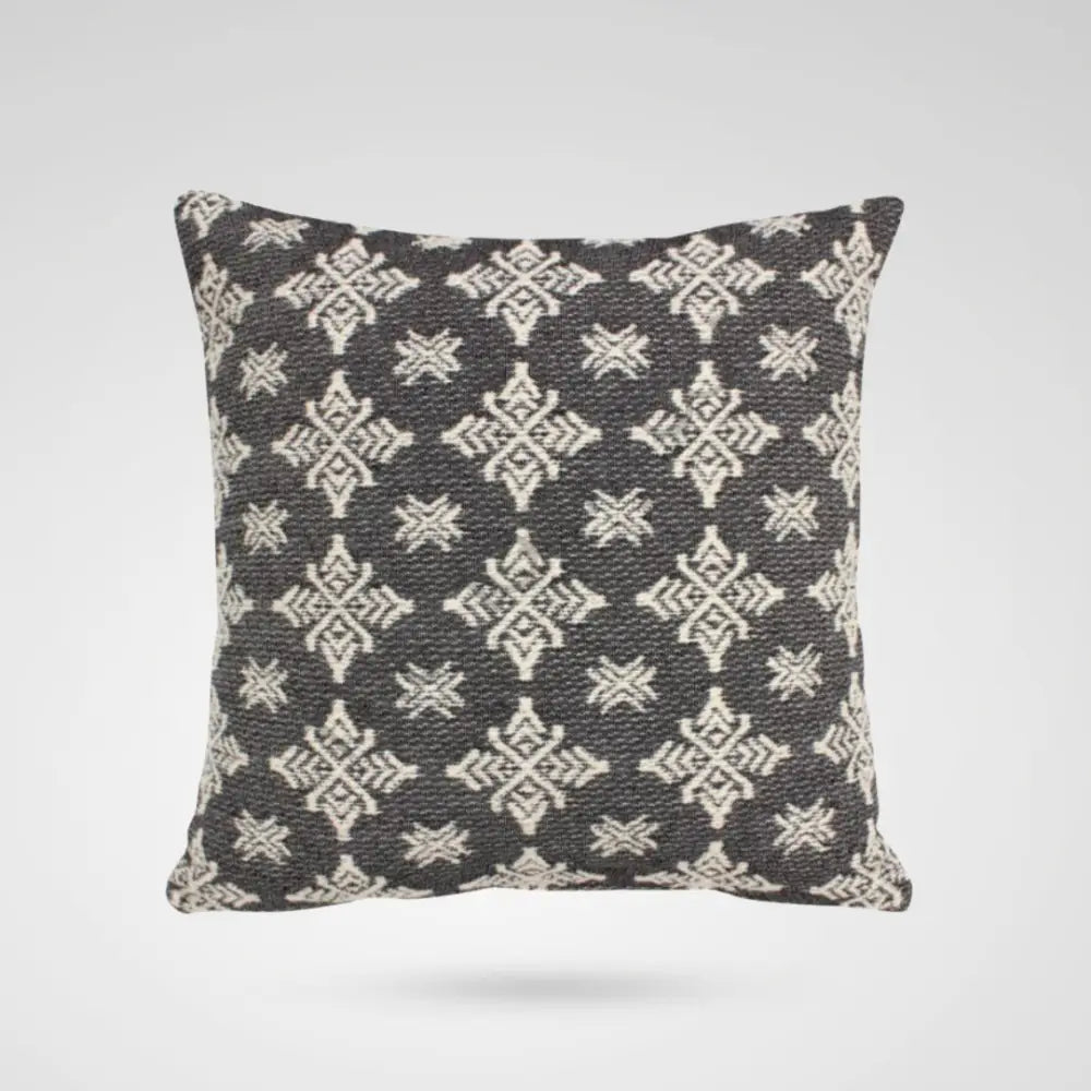 Black and white geometric woven throw cushion cover with a modern monochrome pattern for home decor.