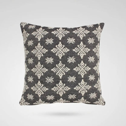 Black and white geometric woven throw cushion cover with a modern monochrome pattern for home decor.
