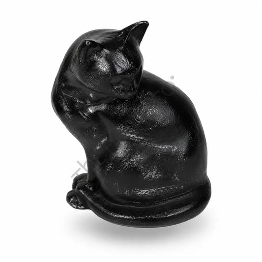 Sleek glossy black sitting cat sculpture with a curled tail for modern home decor. - 2