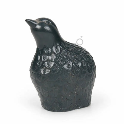 Elegant black ceramic bird-shaped vase with glossy finish and textured feather detailing for modern home decor.