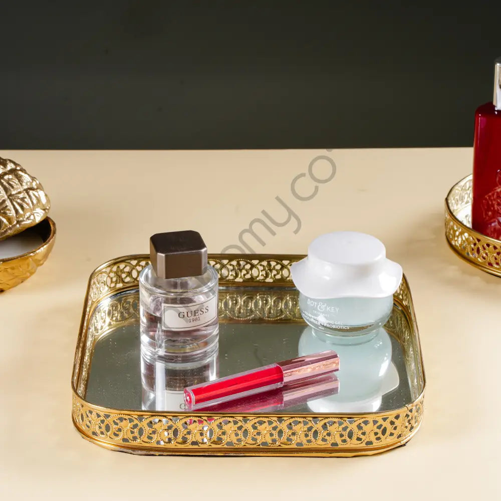 Elegant gold mirror vanity tray with a decorative lattice border for makeup and perfume organization. - 5