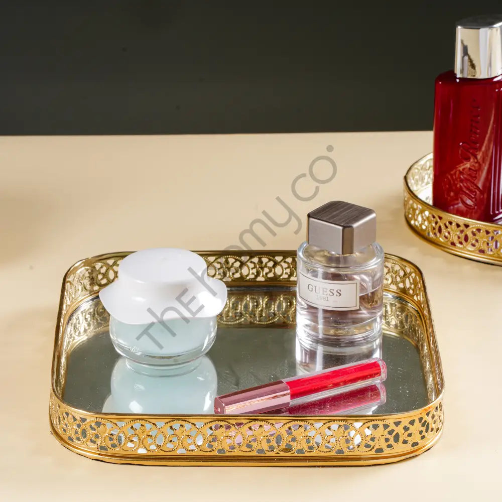 Elegant gold mirror vanity tray with a decorative lattice border for makeup and perfume organization. - 4