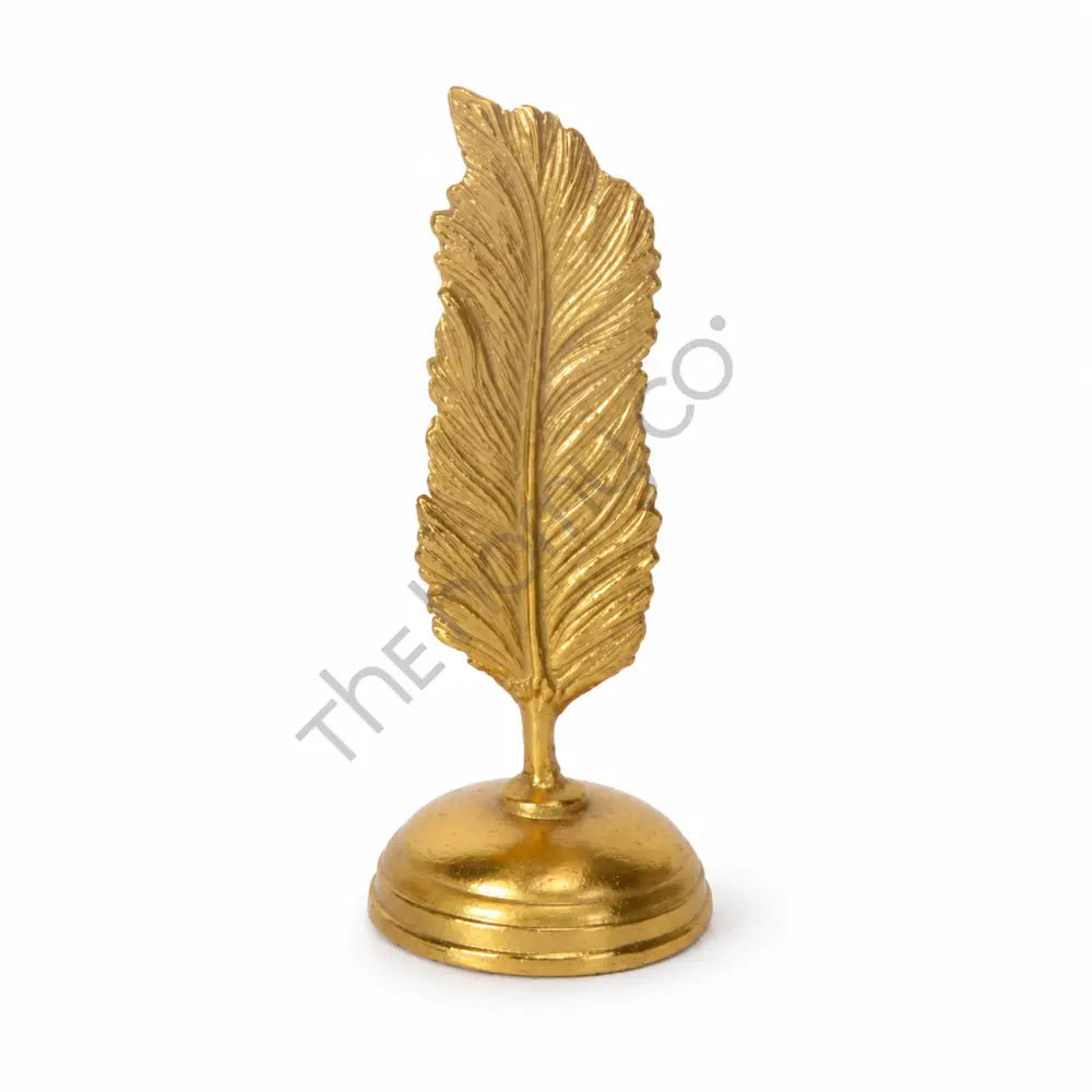 Elegant gold metal leaf sculpture with a metallic finish for modern home decor.