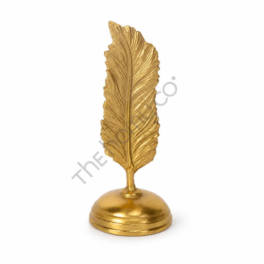 Elegant gold metal leaf sculpture with a metallic finish for modern home decor.