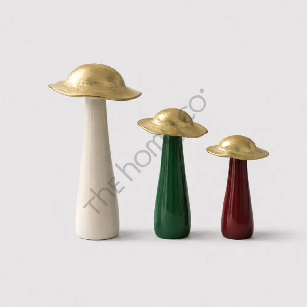 Set of 3 decorative mushroom sculptures with metallic finish tops for modern home decor.