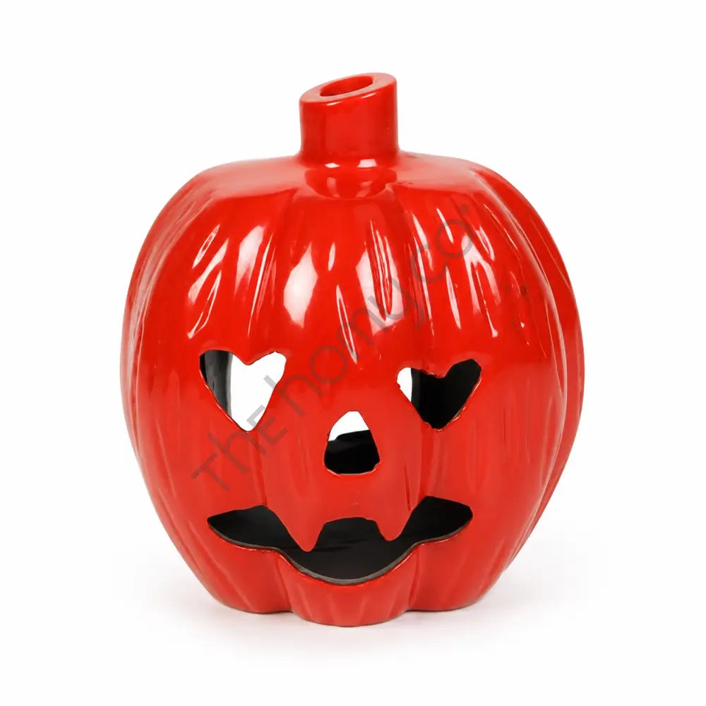Decorative orange Jack-O'-Lantern pumpkin Halloween lantern with carved face detailing for festive home decor.