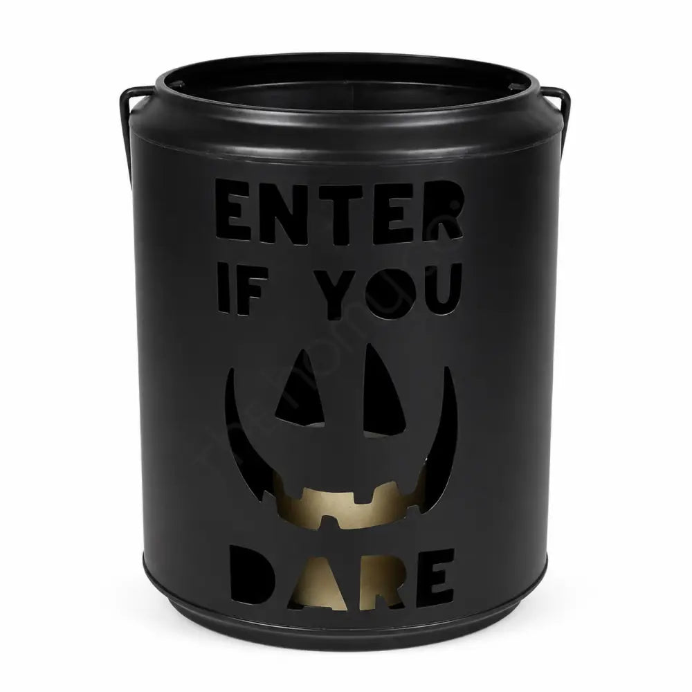 Black metal Halloween lantern with Enter If You Dare and pumpkin face cutout for spooky home decor.