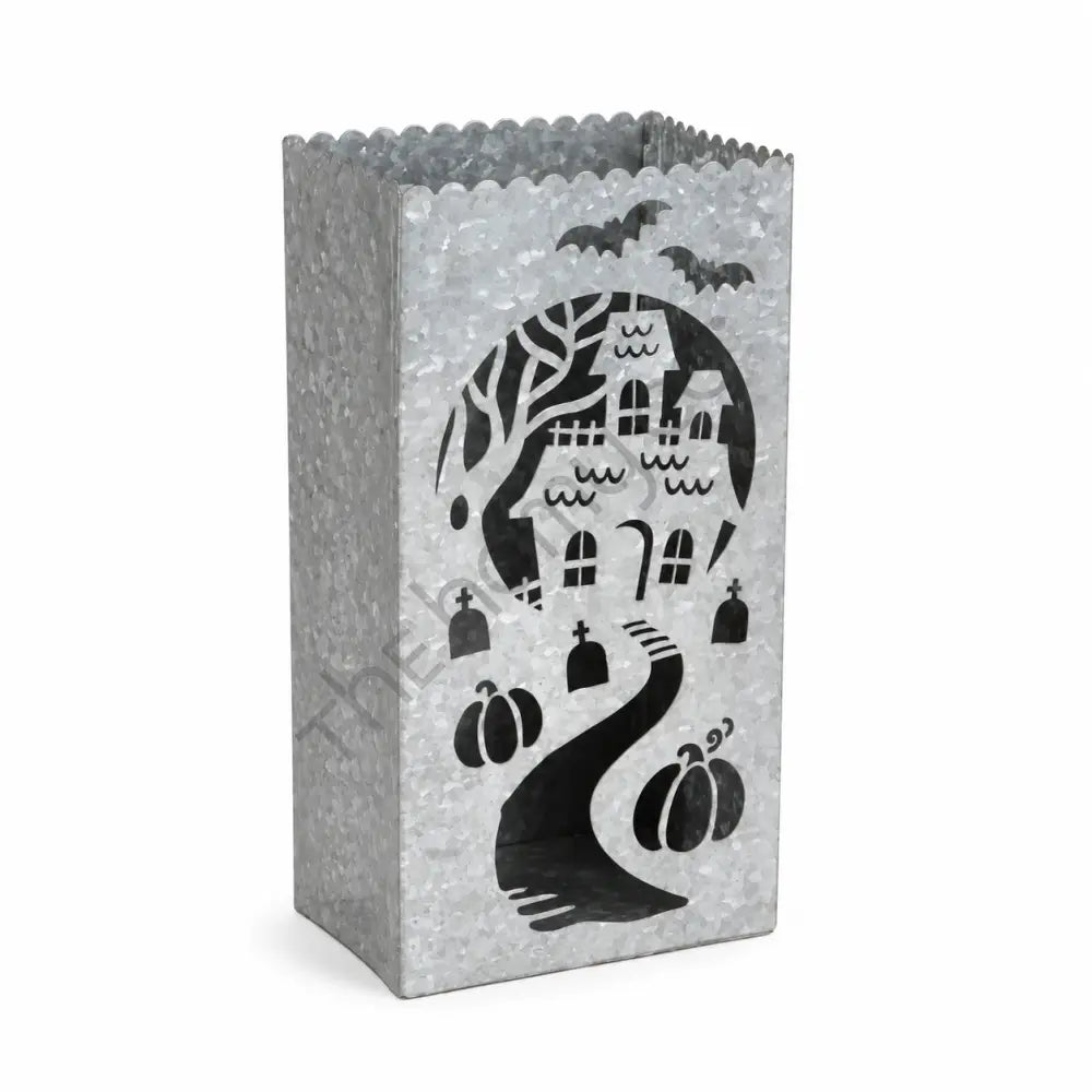 Galvanized haunted house lantern bag with pumpkin and bat cutouts for Halloween decor.