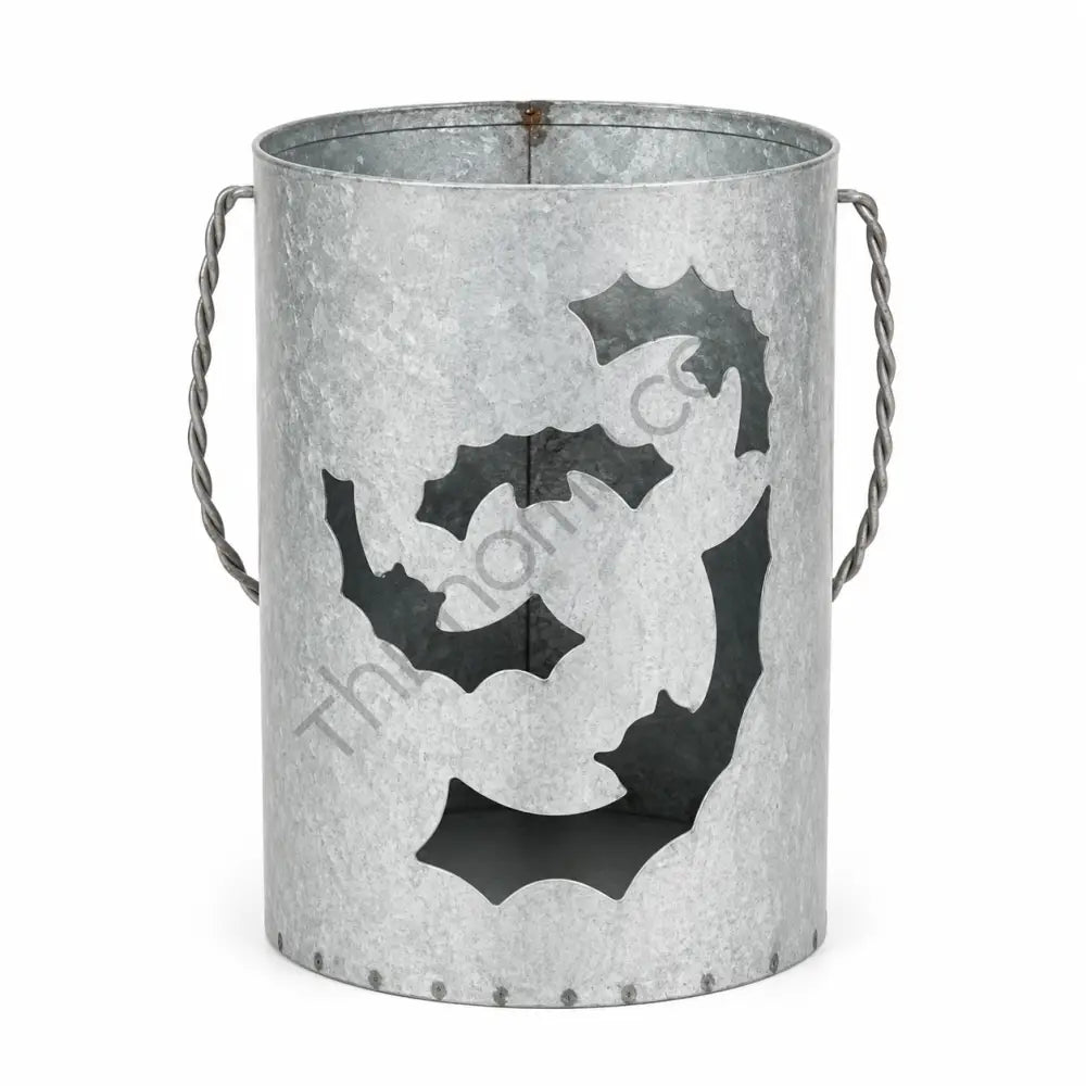 Galvanized metal bat lantern bucket with rustic cutout designs for Halloween home decor.