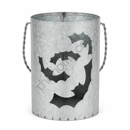 Galvanized metal bat lantern bucket with rustic cutout designs for Halloween home decor.