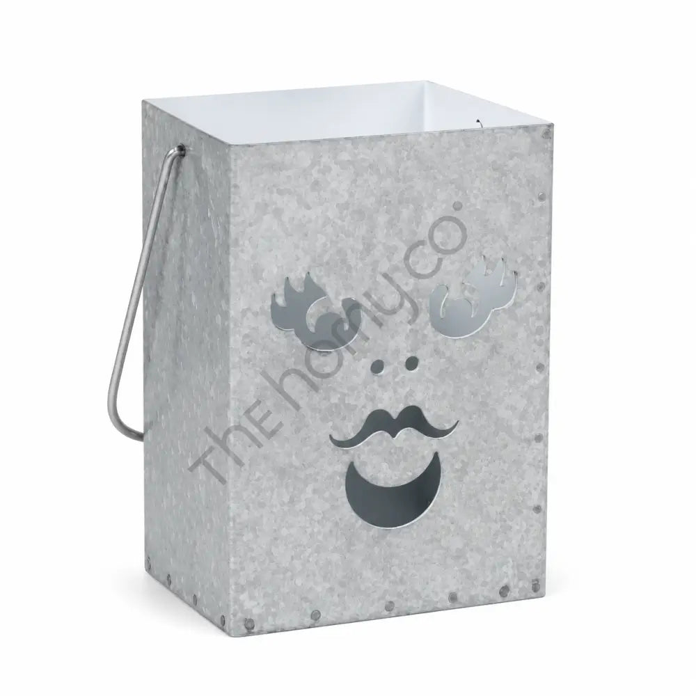 Rustic galvanized metal Halloween ghost lantern bucket with a spooky cutout face for holiday home decor.
