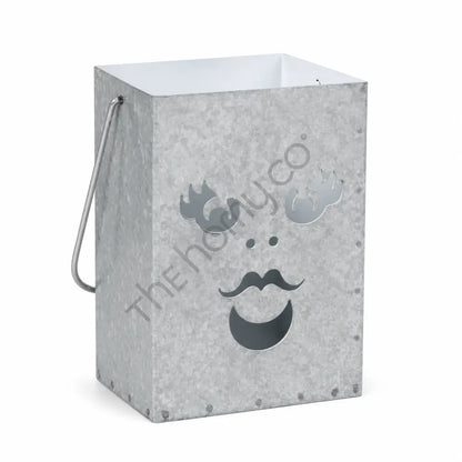 Rustic galvanized metal Halloween ghost lantern bucket with a spooky cutout face for holiday home decor.