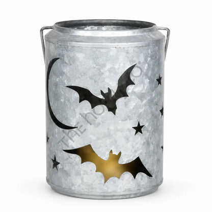 Galvanized metal Halloween lantern bucket with bat and star cutouts for rustic farmhouse decor.