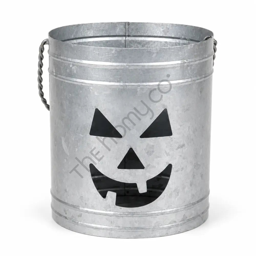Rustic galvanized metal pumpkin jack-o-lantern lantern bucket for Halloween home decor.