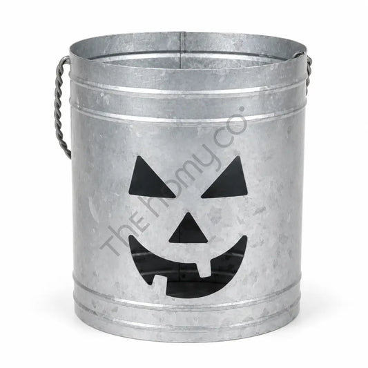 Rustic galvanized metal pumpkin jack-o-lantern lantern bucket for Halloween home decor.