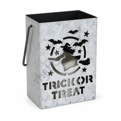 Rustic silver galvanized metal Halloween lantern bucket featuring a flying witch silhouette and Trick or Treat cutout design.