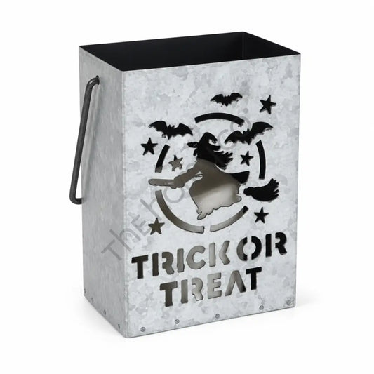 Rustic silver galvanized metal Halloween lantern bucket featuring a flying witch silhouette and Trick or Treat cutout design.