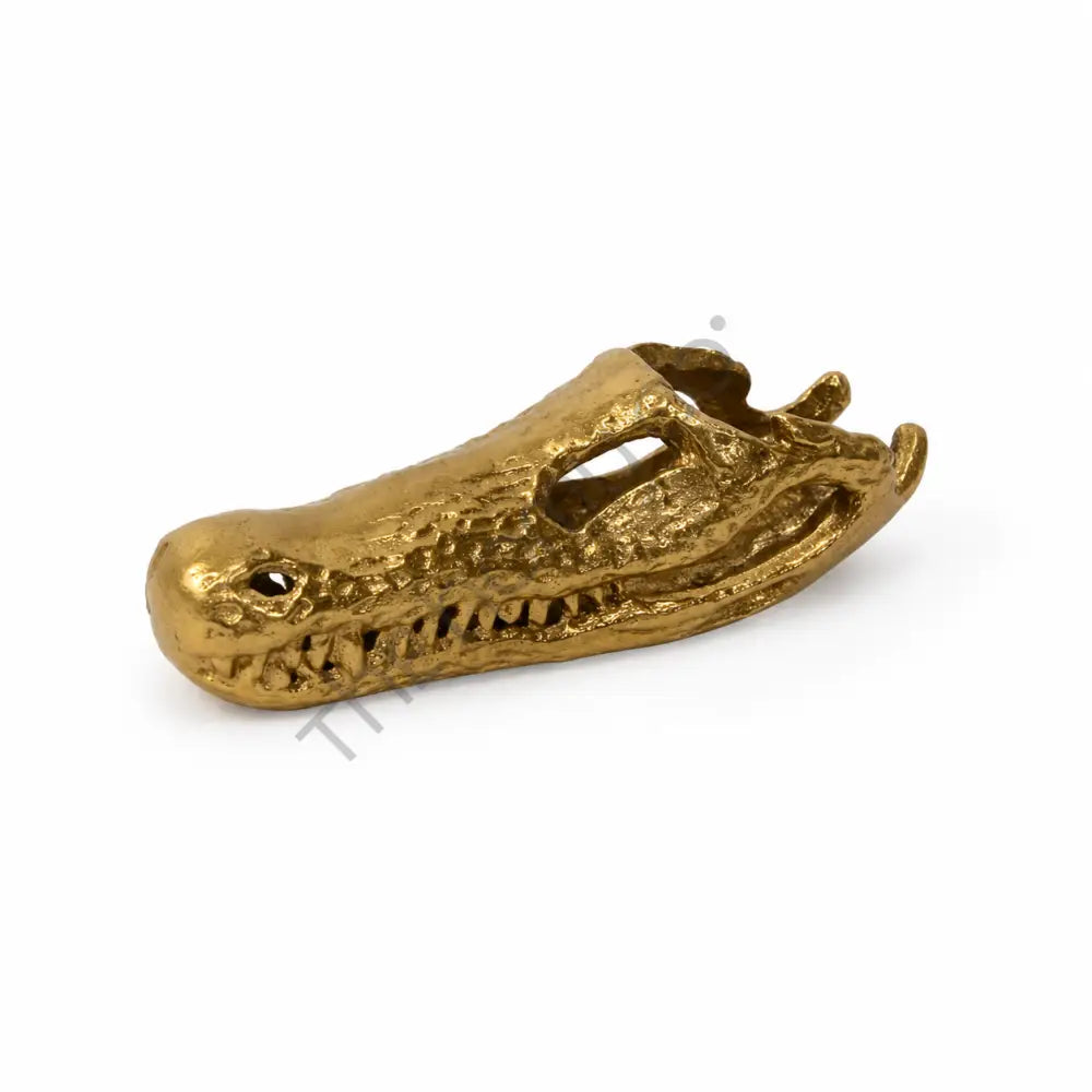 Gold crocodile skull decorative showpiece for modern home and office decor.