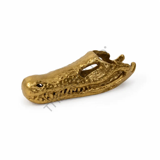 Gold crocodile skull decorative showpiece for modern home and office decor.