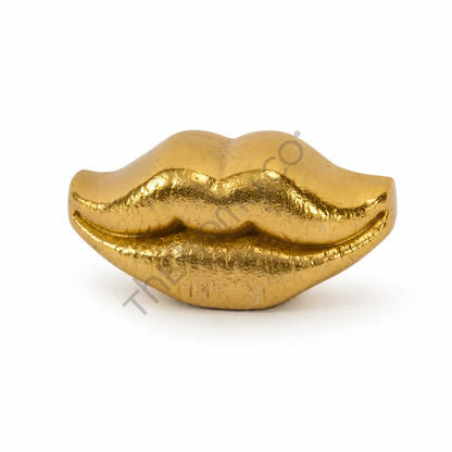Modern gold lips decorative sculpture with a metallic finish for contemporary home decor.