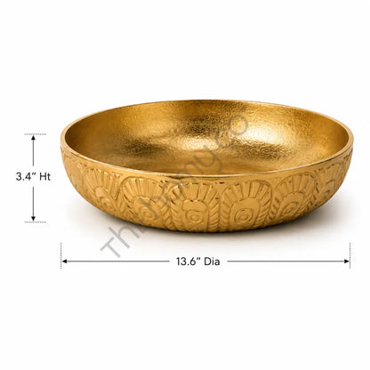 Gold metal centerpiece serving bowl with textured interior for modern home decor.