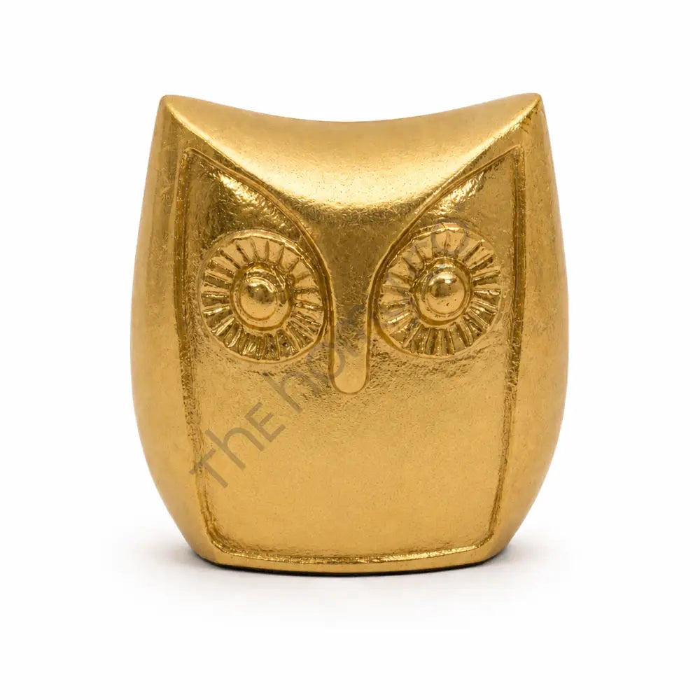 Elegant gold owl shaped decorative bowl and storage dish for home decor.