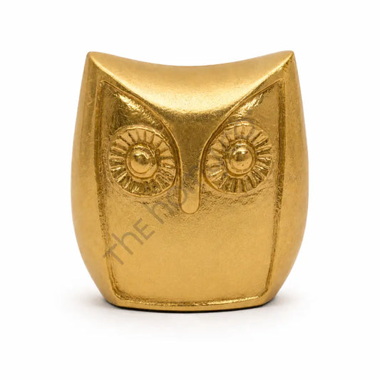 Elegant gold owl shaped decorative bowl and storage dish for home decor.