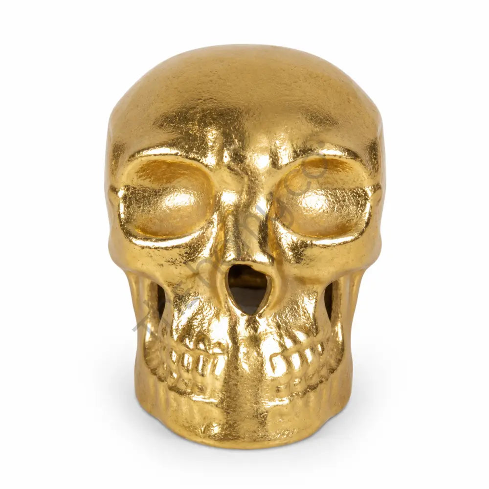 Modern gold skull decorative showpiece with a metallic finish for luxury gothic home decor.