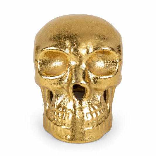 Modern gold skull decorative showpiece with a metallic finish for luxury gothic home decor.