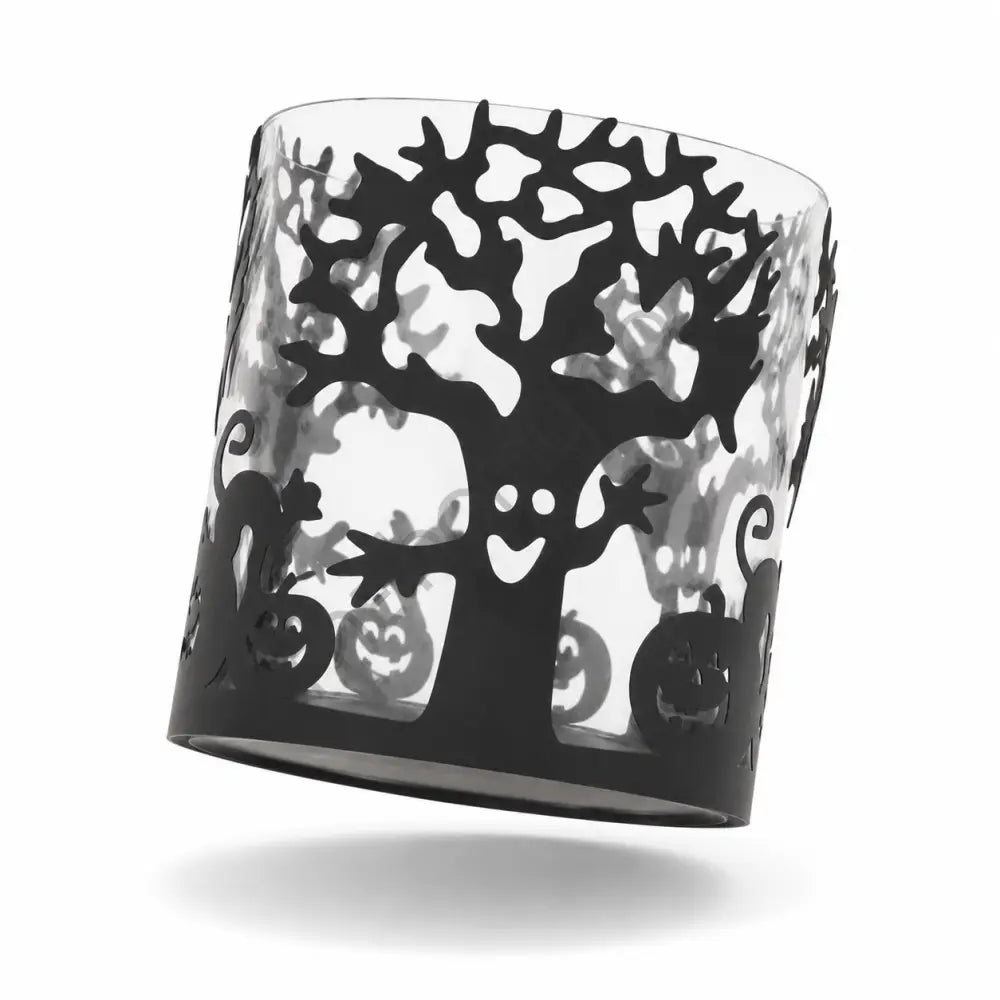 Halloween glass candle holder featuring a black tree silhouette and pumpkin details for spooky festive decor. - 2