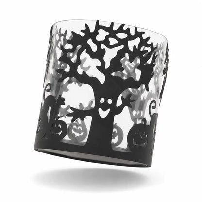 Halloween glass candle holder featuring a black tree silhouette and pumpkin details for spooky festive decor. - 2