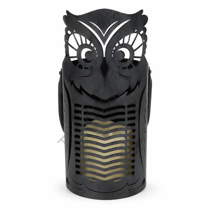 Black metal owl lantern candle holder with intricate cutout detailing for Halloween home decor.