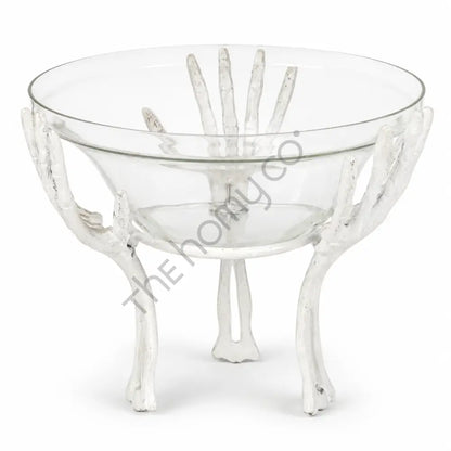 Halloween skeleton hand glass serving bowl for spooky party table decor.