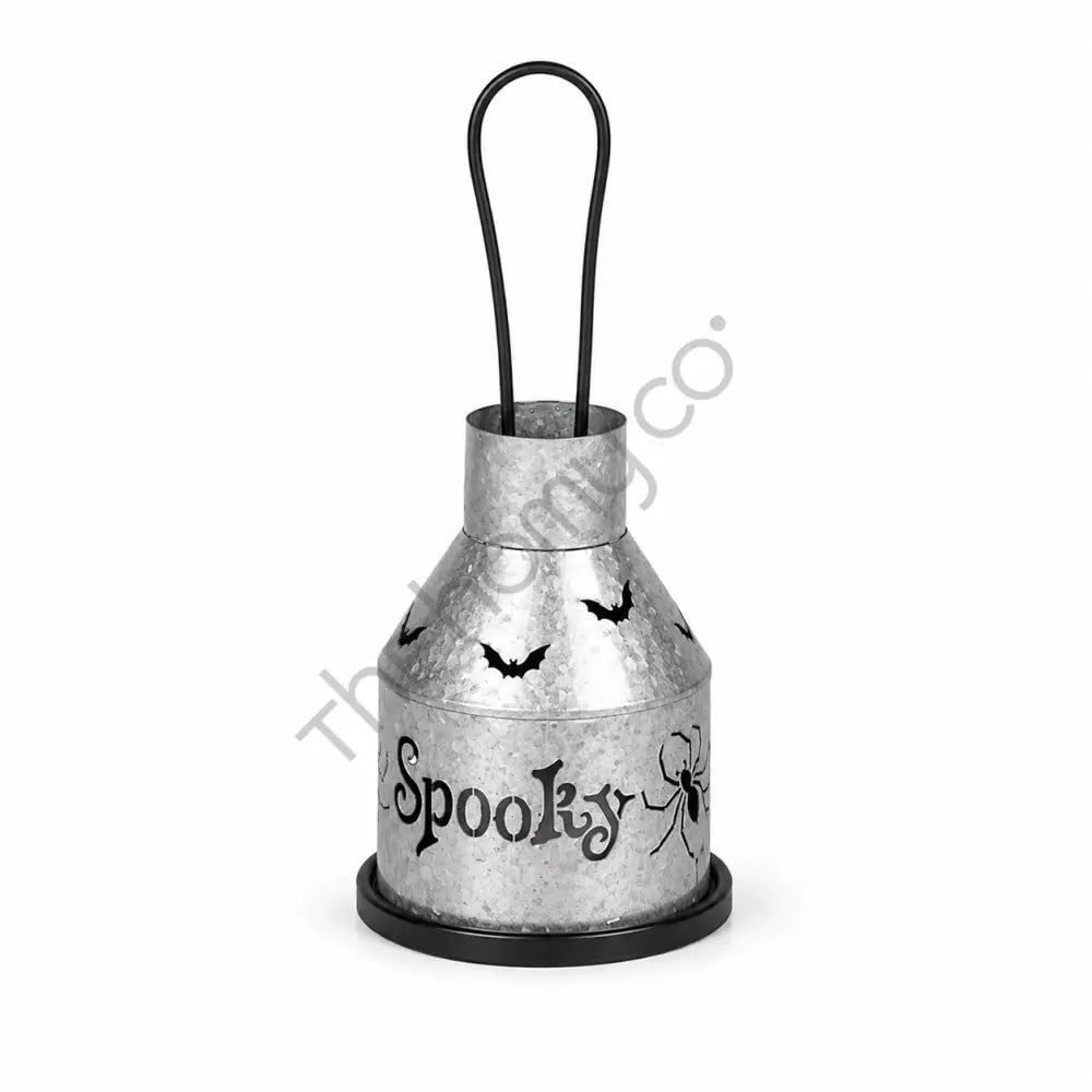 Rustic silver metal Halloween lantern with Spooky cutout design for holiday candle decor.