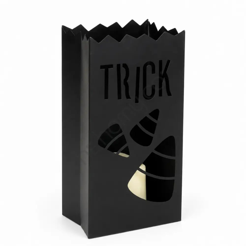 Matte black metal Halloween lantern with TRICK and candy corn cutouts for festive home decor.