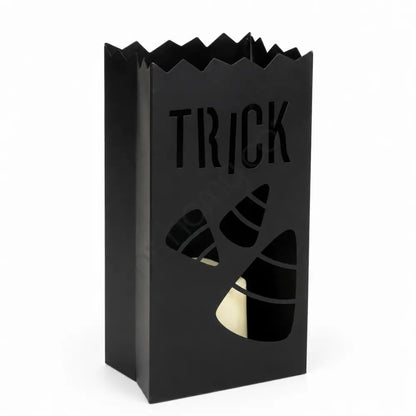 Matte black metal Halloween lantern with TRICK and candy corn cutouts for festive home decor.