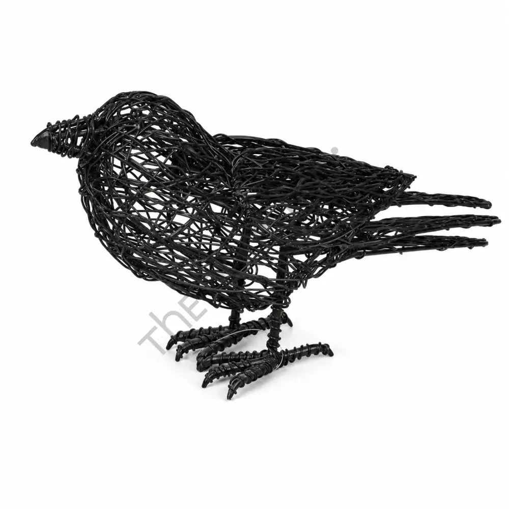 Handcrafted black wire bird sculpture with minimalist woven metal design for modern tabletop decor.