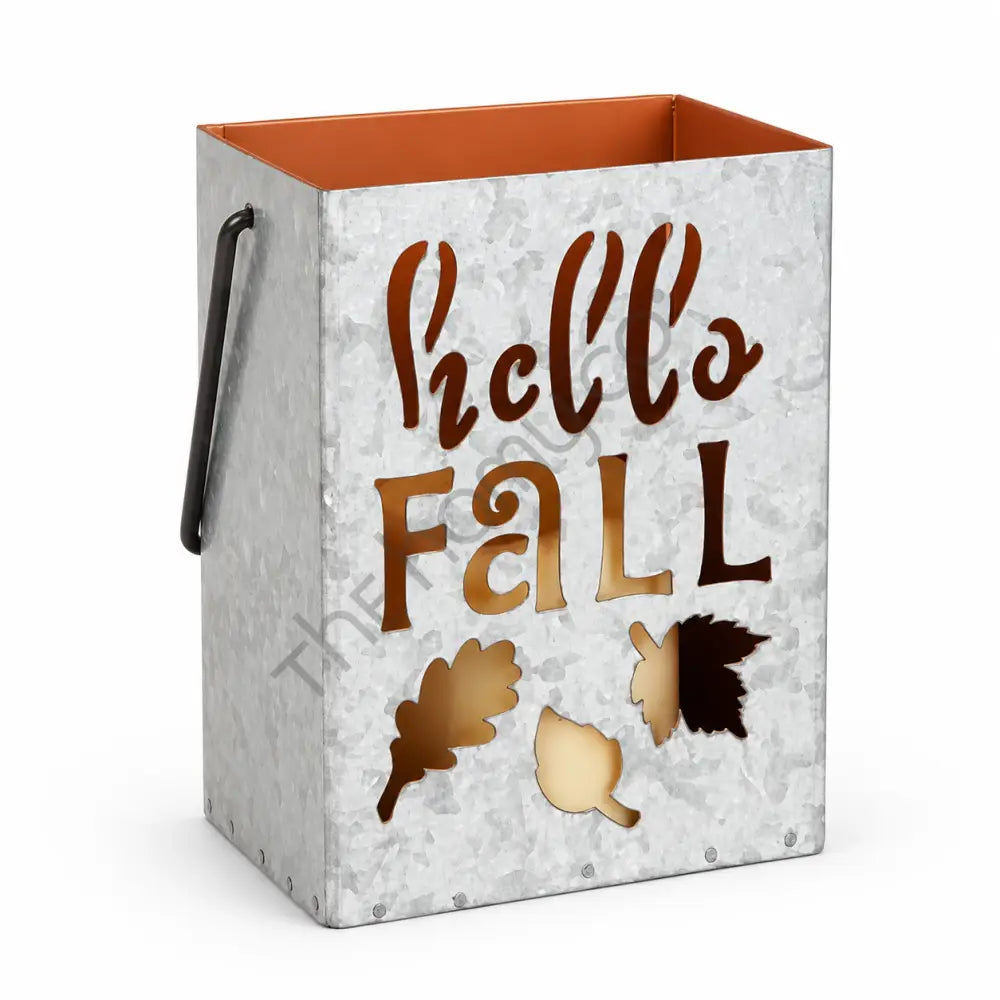 Rustic galvanized metal "Hello Fall" lantern bucket with leaf cutouts and an orange interior for autumn home decor.