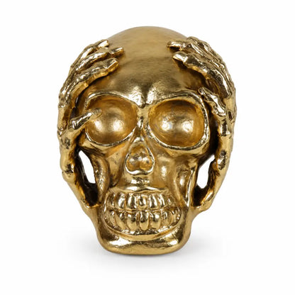 Luxury gold skull sculpture with hand-over-eyes design for modern home and office decor.