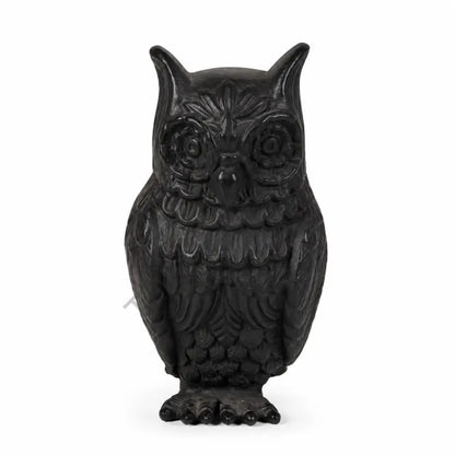 Elegant matte black owl showpiece with intricate feather detailing for modern home and office decor.