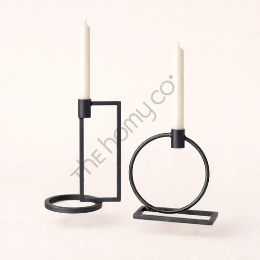 Minimalist set of two geometric black metal candle holders for modern home decor and taper candles. - 2